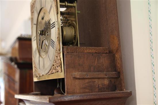 George Hewett of Marlborough. A George III oak eight day longcase clock, H.7ft 9in.